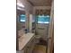 Bathroom with a vanity, commode, and shower at 856 New Hope Rd, Fayetteville, GA 30214