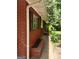 Side view of a traditional brick home showing clean gutters and landscaping at 856 New Hope Rd, Fayetteville, GA 30214