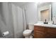 Neutral bathroom featuring a vanity with cabinet and a shower and tub combination at 9067 Bob Jackson Dr, Jonesboro, GA 30238