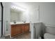 Bright bathroom with double vanity and modern lighting at 9067 Bob Jackson Dr, Jonesboro, GA 30238
