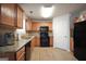 Functional kitchen with granite countertops and appliances at 9067 Bob Jackson Dr, Jonesboro, GA 30238