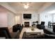 Inviting living room features a fireplace and a ceiling fan at 9067 Bob Jackson Dr, Jonesboro, GA 30238