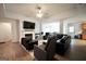 Bright living room with a fireplace and views of the adjacent dining area at 9067 Bob Jackson Dr, Jonesboro, GA 30238