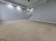 Large finished basement with neutral carpeting, ready for customization and entertainment at 3773 Summer Rose Dr, Atlanta, GA 30341