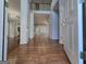 Spacious foyer with hardwood floors and elegant architectural details with views to a grand staircase at 3773 Summer Rose Dr, Atlanta, GA 30341