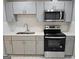 Updated kitchen featuring stainless steel appliances, modern cabinetry, and white subway tile backsplash at 3773 Summer Rose Dr, Atlanta, GA 30341
