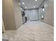 Kitchen with stainless steel appliances, gray cabinetry and tile floors with patio door at 3773 Summer Rose Dr, Atlanta, GA 30341