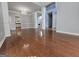 Expansive living room with hardwood floors and view to a well-appointed kitchen at 3773 Summer Rose Dr, Atlanta, GA 30341