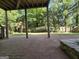 View from under the deck, looking out to the brick patio and backyard at 3773 Summer Rose Dr, Atlanta, GA 30341