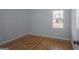 Bedroom featuring hardwood floors, natural light, and neutral paint at 1684 Lake Harbin Rd, Morrow, GA 30260