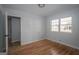 Comfortable bedroom with hardwood floors and neutral wall color at 1684 Lake Harbin Rd, Morrow, GA 30260