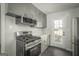 Stylish kitchen with stainless steel range and plentiful counter space at 1684 Lake Harbin Rd, Morrow, GA 30260