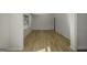 Spacious living room with gleaming hardwood floors and freshly painted walls at 1684 Lake Harbin Rd, Morrow, GA 30260