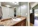 Bathroom with a vanity and a mirror at 465 Harris Dr, Conyers, GA 30012