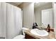 Bathroom featuring a shower with white curtain and a vanity at 465 Harris Dr, Conyers, GA 30012