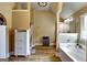 Bright bathroom showcasing a built-in tub, modern storage, and stylish finishes at 465 Harris Dr, Conyers, GA 30012