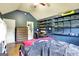 Bedroom featuring built-in shelving and dark accent wall at 465 Harris Dr, Conyers, GA 30012