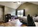 Bedroom with a window and ceiling fan at 465 Harris Dr, Conyers, GA 30012