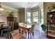 Sunlit breakfast nook features a bay window and natural light at 465 Harris Dr, Conyers, GA 30012