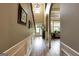 Welcoming foyer with hardwood floors, staircase, and arched doorway, creating a grand entrance at 465 Harris Dr, Conyers, GA 30012