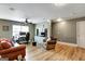 Bright living room is well-lit, providing both workspace and comfortable seating at 465 Harris Dr, Conyers, GA 30012