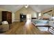 Large main bedroom with peaked ceiling, wood floors, and ample natural light at 465 Harris Dr, Conyers, GA 30012