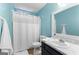 Bright bathroom showcasing a shower, toilet, vanity, and towel bar at 135 Birdsong Ln, Fayetteville, GA 30215