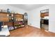 Dining area with hardwood floors, built-in shelves, and easy access to the kitchen at 135 Birdsong Ln, Fayetteville, GA 30215