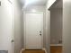 Bright entryway with hardwood floors and neutral paint at 2820 Lloyd Rd, Decatur, GA 30034