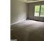 Bedroom featuring neutral paint colors and natural light at 227 Cedars Glen Cir, Villa Rica, GA 30180