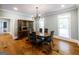 Elegant dining room with hardwood floors and natural light that's great for entertaining at 5780 Pumkintown Rd, Douglasville, GA 30135