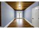Versatile room with hardwood floors and natural light, perfect for customization at 5780 Pumkintown Rd, Douglasville, GA 30135