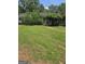 Charming home featuring a well-manicured front yard, stone accents, and a inviting walkway at 5780 Pumkintown Rd, Douglasville, GA 30135