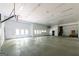 Oversized garage with high ceilings, ample space for vehicles, storage and recreational activities at 5780 Pumkintown Rd, Douglasville, GA 30135