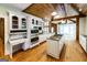 Gourmet kitchen features stainless appliances, granite countertops, custom cabinets and kitchen island at 5780 Pumkintown Rd, Douglasville, GA 30135