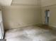 Spacious main bedroom featuring a tray ceiling, carpet floors and ensuite bathroom at 9160 Woodhaven Way, Mcdonough, GA 30253