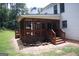 The backyard features a screened-in porch and well-maintained yard, perfect for relaxation and outdoor activities at 74 Flanders Ct, Douglasville, GA 30134