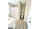 Cozy bathroom featuring a shower-tub combo with modern fixtures at 7728 Fawn Cir, Covington, GA 30014