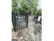 Community dog park with gated entry and seating area at 7728 Fawn Cir, Covington, GA 30014