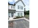 Charming two-story home with light blue siding and gray shutters at 7728 Fawn Cir, Covington, GA 30014