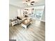 Spacious living room with hardwood floors and an open floor plan at 7728 Fawn Cir, Covington, GA 30014
