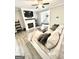 Cozy living room with a fireplace and a comfortable couch at 7728 Fawn Cir, Covington, GA 30014