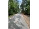 Scenic community walking path surrounded by lush greenery at 7728 Fawn Cir, Covington, GA 30014