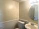 Bathroom with white wainscotting and cream colored walls at 443 S Rays Rd, Stone Mountain, GA 30083