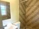 Bathroom with a tiled shower and vanity at 443 S Rays Rd, Stone Mountain, GA 30083