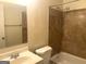 Cozy bathroom featuring tile tub and shower at 443 S Rays Rd, Stone Mountain, GA 30083