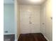 Welcoming entryway featuring double doors, hardwood floors, and neutral wall paint at 443 S Rays Rd, Stone Mountain, GA 30083