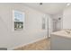 Bathroom with double sink vanity and a bright window, with an attached water closet at 608 Whitman Lane # 2028, Stockbridge, GA 30281