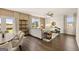 An open living room with neutral color palette, a ceiling fan and an outside view at 608 Whitman Lane # 2028, Stockbridge, GA 30281