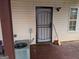 Back door entryway to home featuring an AC unit and a security camera at 5700 Miles Rd, South Fulton, GA 30349